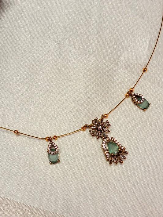 Pastel green lotus - invisible necklace
